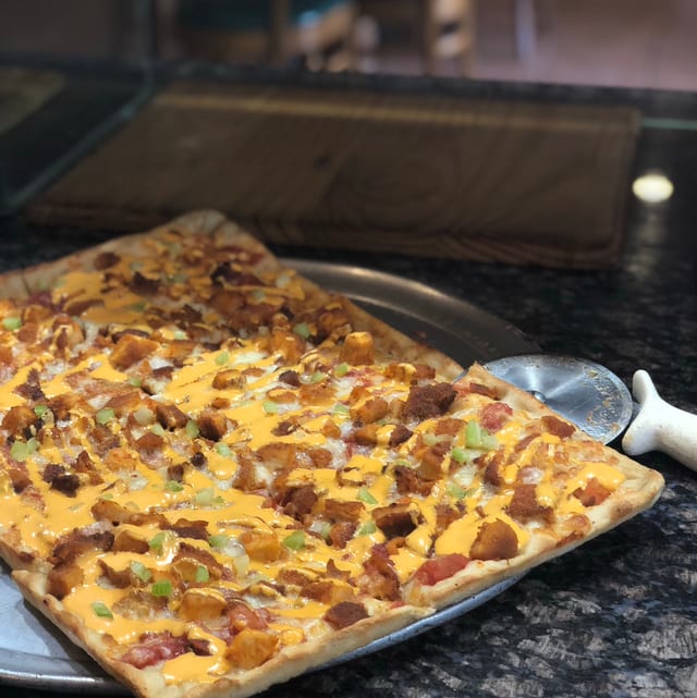 Buffalo Chicken Gourmet Sicilian Pizza.